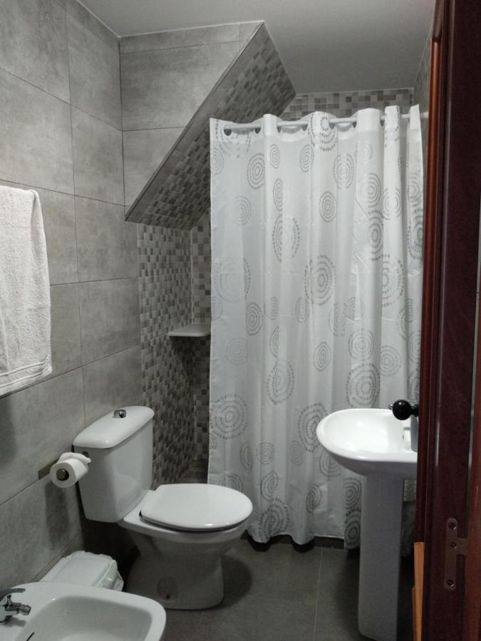 Habitación Individual con ducha y aseo compartidos