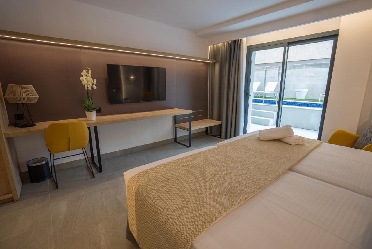 Suite Junior con acceso directo a la piscina (2 adultos)