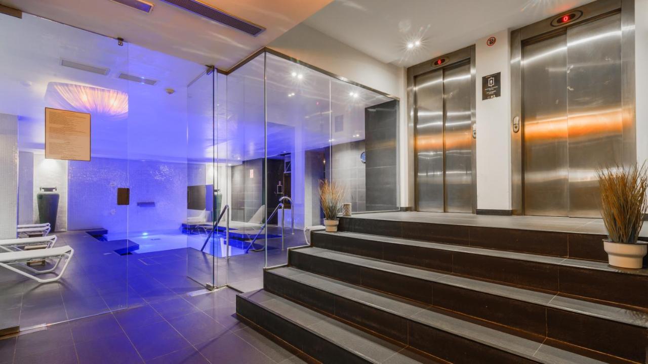 Attic terrace room includes one access to the spa per person per