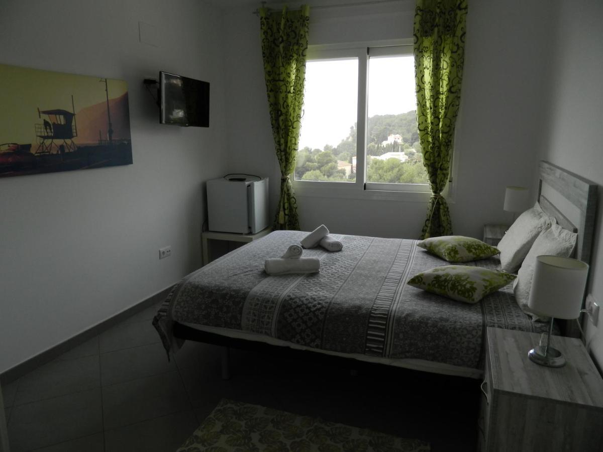 Habitación Familiar con vista lateral al mar