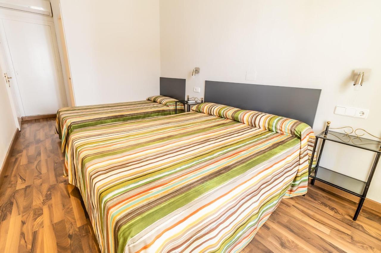 Habitación Triple con balcón