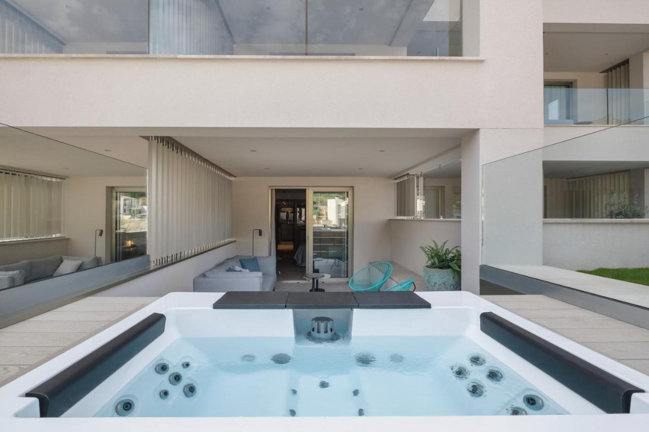 Junior Suite with Hot Tub and Terace with Side Sea View,1258028554:JPEG