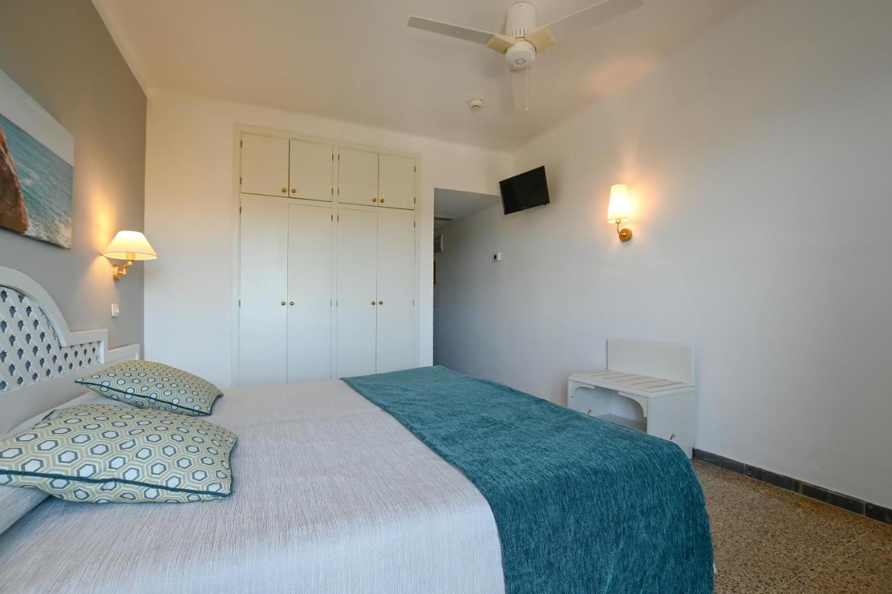 Double Room with Side Sea View (2 Adults + 1 Child),1306165672:JPEG