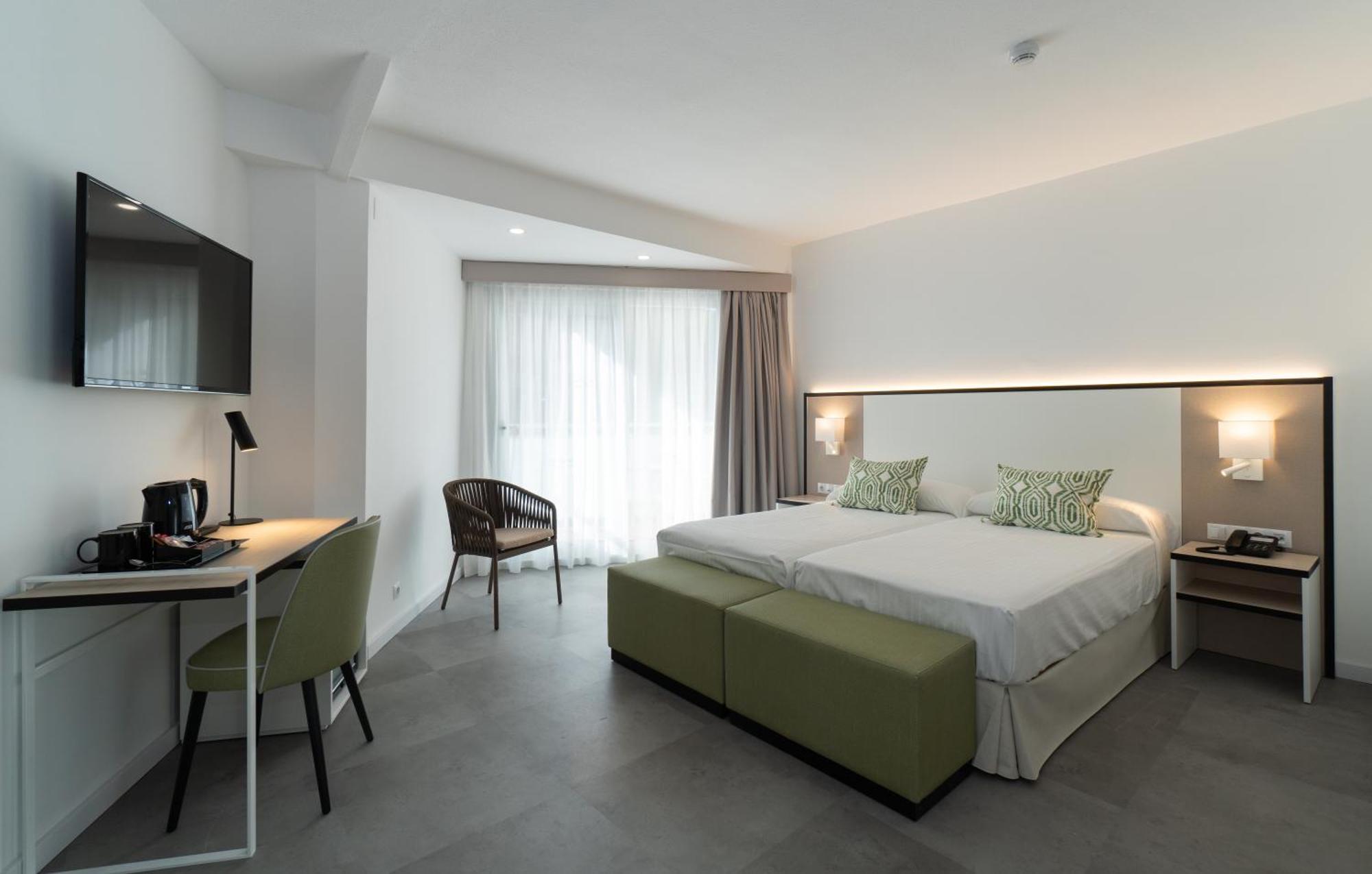 Twin Room with Balcony (2 Adults + 1 Child)