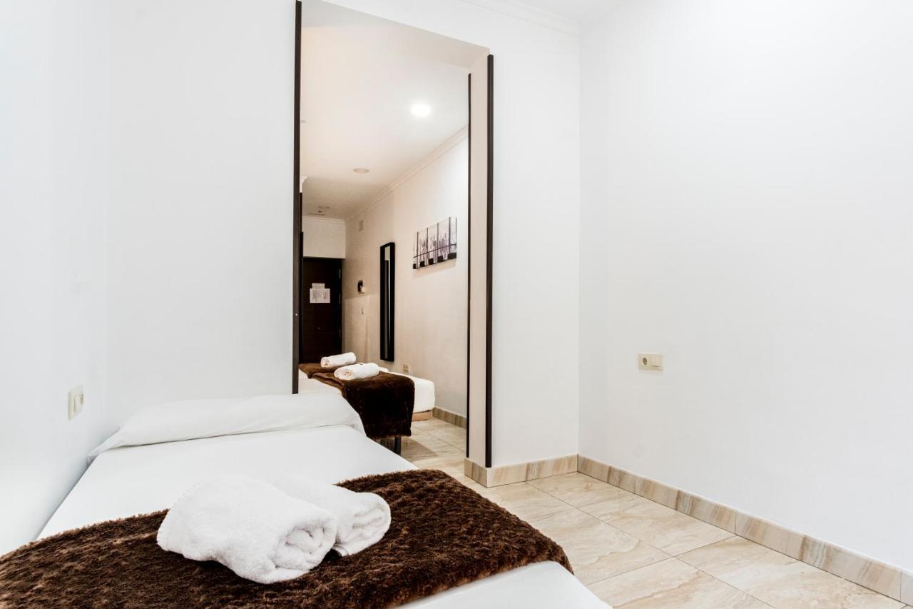 Habitación Triple con vistas a la ciudad