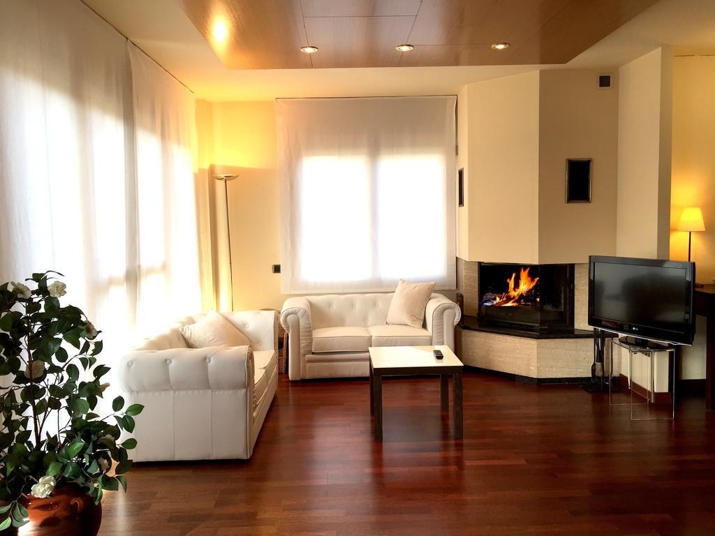 Suite avec Cheminée et Accès au Spa
