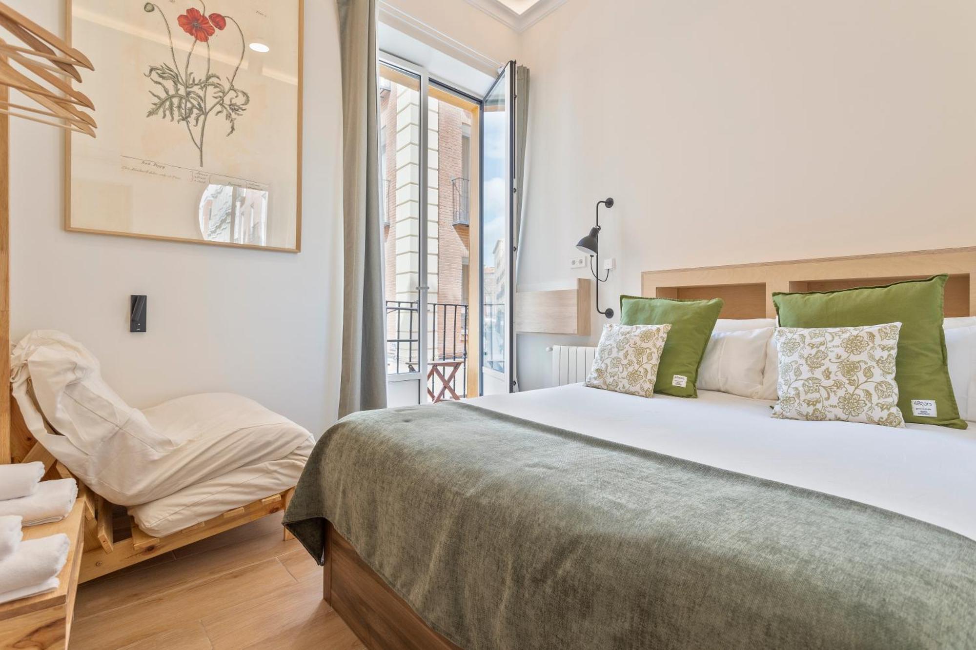 Chambre Double avec Balcon (3 Adultes)