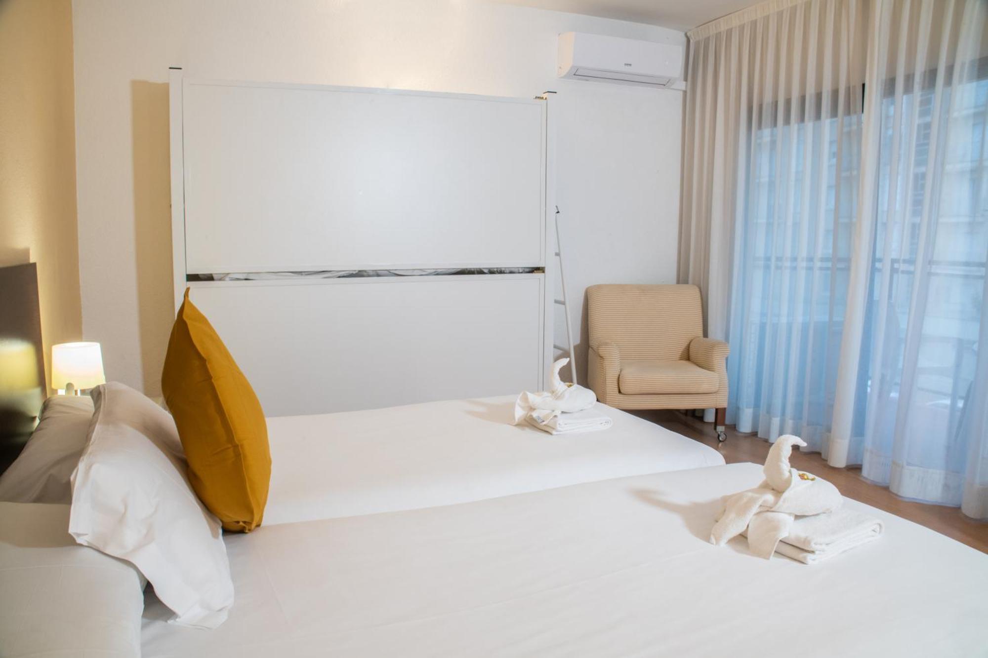 Double or Twin Room with Side Sea View