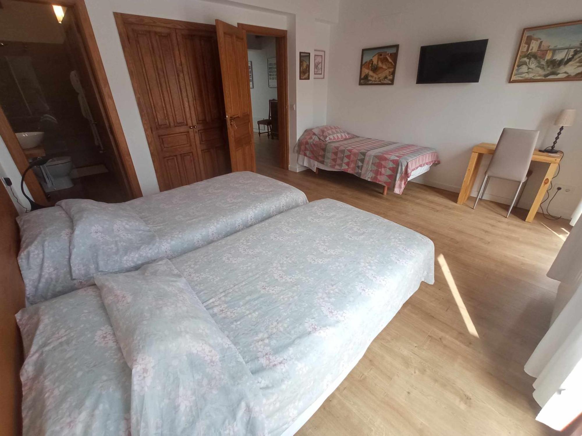 Habitación Triple con balcón