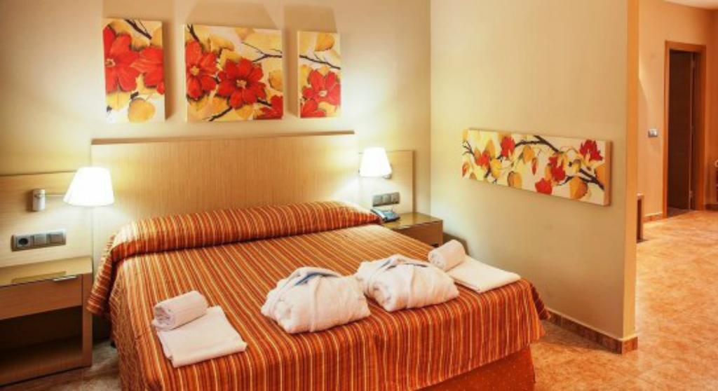 Habitación Doble con cama supletoria (3 adultos)