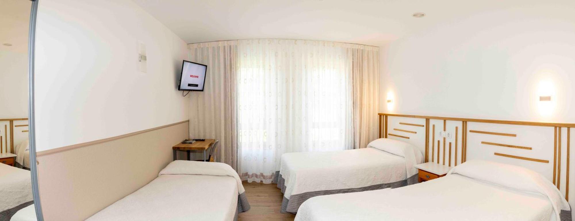 Habitación Doble con cama supletoria - 2 camas