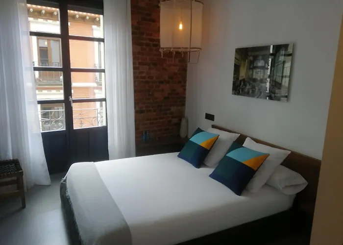 13 Suites León